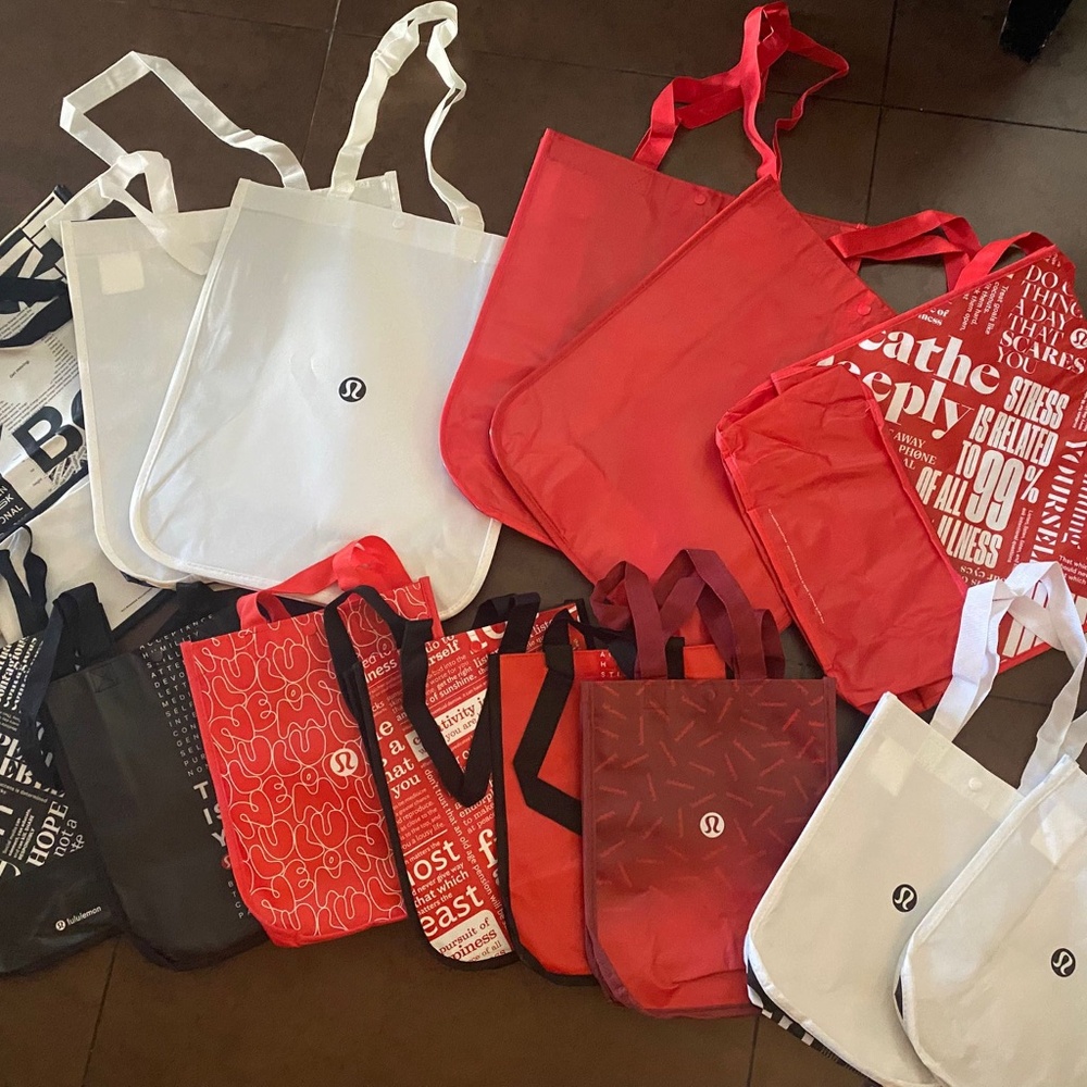 Lot of 14 lululemon shopping bags
